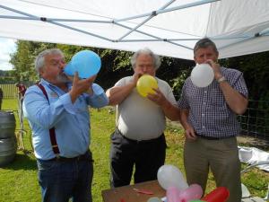 WINDBAGS - possibly the perfect choice of Rotarians to blow up the Balloons prior to the start of proceedings - Garet R, Alwyn & Elfed
